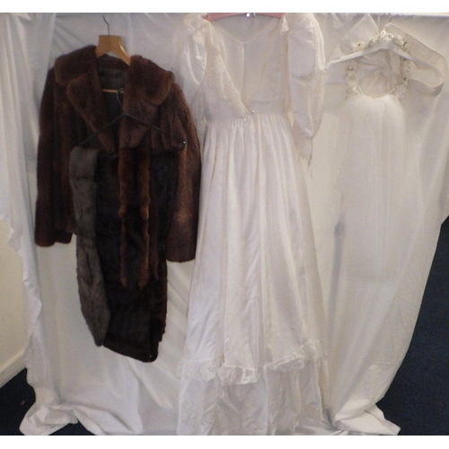 371 - A fur coat, stole, wedding dress etc