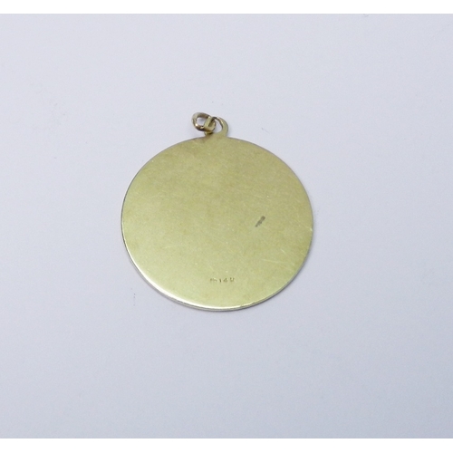54 - A Saint Christopher pendant, yellow metal marked 14k.  25mm across.