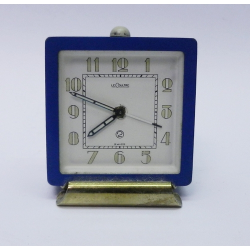 82 - A LeCoultre 2 Day alarm clock having a manual wind movement in a blue finished base metal square cas... 