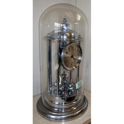 202 - A large plated anniversary clock in a glass dome 44cm tall af