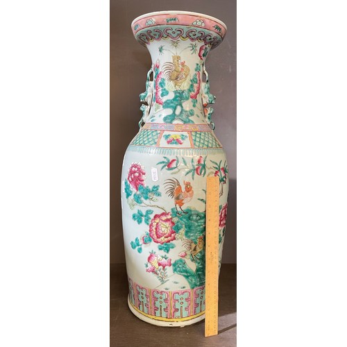 194 - A large Famille Rose porcelain floor vase 60cm tall.
