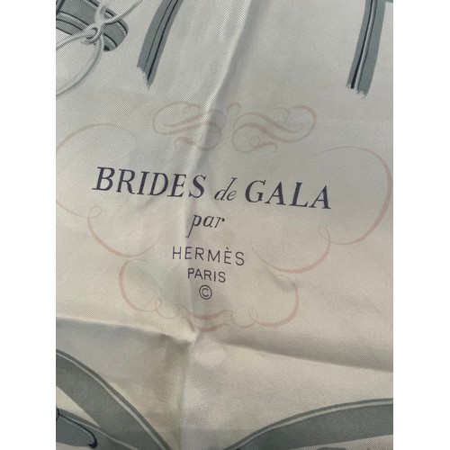 91 - A Hermes scarf – “Brides de Gala” Designed by Hugo Grygkar and first issued in 1957, in grey, ivory ... 