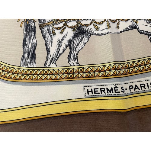 93 - A Hermes scarf – “Grand Apparat”. Designed by Jacques Eudel and first issued in 1962, in the brown, ... 