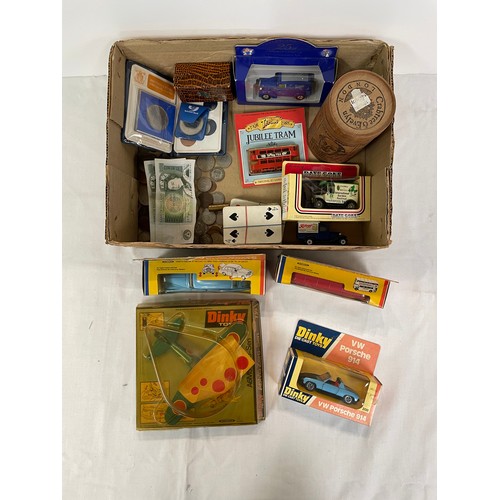 176 - Three boxed Dinky cars and a Dinky a Zero-Sen 739 aeroplane together with misc coins and collectable... 