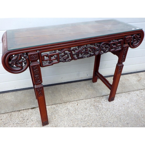 A Chinese hardwood alter/side table, 117cm wide
