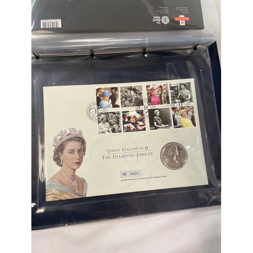 164 - Royal Mail / Royal Mint Philatelic Numismatic Covers: two slip-cover albums containing approximately... 