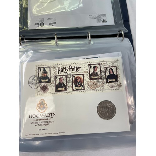 166 - Royal Mail / Royal Mint Philatelic Numismatic Covers: two slip-cover albums containing approximately... 