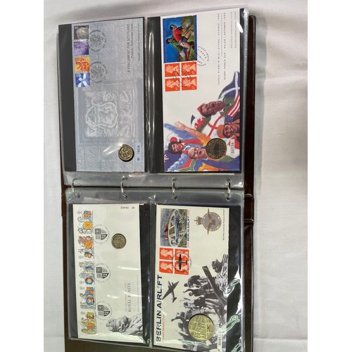 167 - Royal Mail / Royal Mint Philatelic Numismatic Covers: two slip-cover albums containing approximately... 
