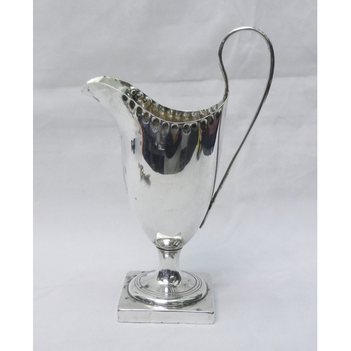 24 - George III and later silver: a helmet creamer, London 1809, spout a/f, 150mm tall; a sifter spoon; a... 