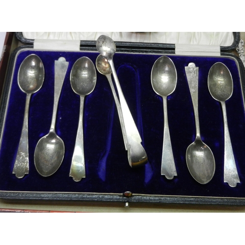 39 - A cased set of six silver coffee spoons with matching tongs, Sheffield 1922; a silver mustard pot wi... 