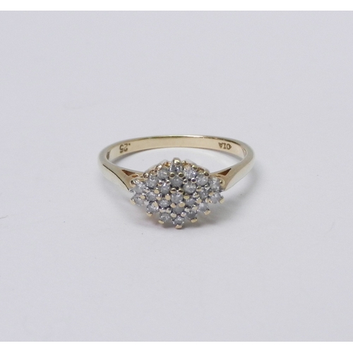 74 - A cluster ring comprising round cut diamonds in a lozenge shaped head, 9ct gold.  Size O / head 10 x... 