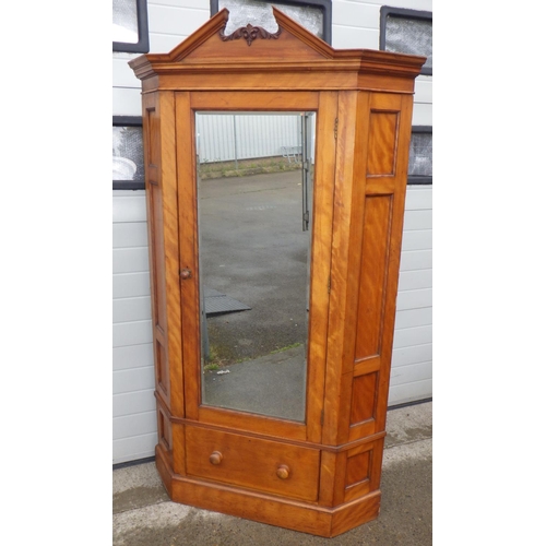 888 - A Victorian corner wardrobe with mirrored door, old worm, 205cm tall