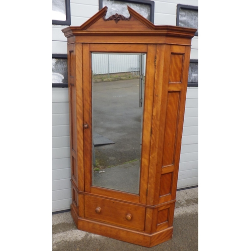 888 - A Victorian corner wardrobe with mirrored door, old worm, 205cm tall