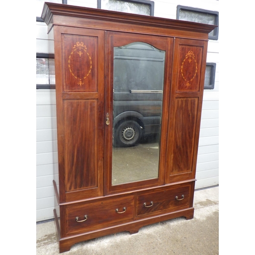 889 - An Edwardian mahogany & inlaid wardrobe with mirrored door, worm to back, 154cm wide