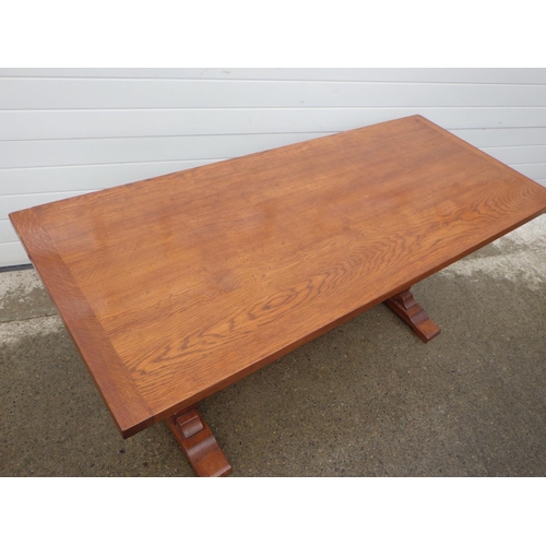 897 - An oak refectory table on barleytwist supports, 183cm x76cm