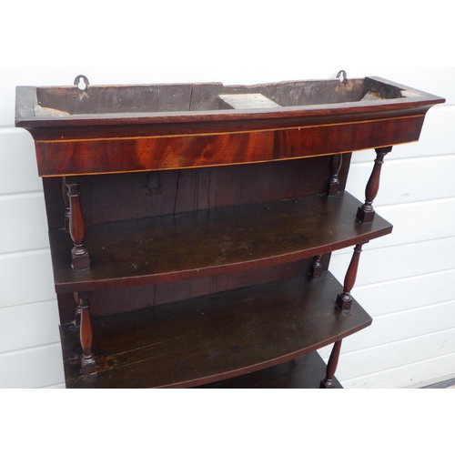 899 - A set of waterfall shelves on a two drawer base, 61cm wide