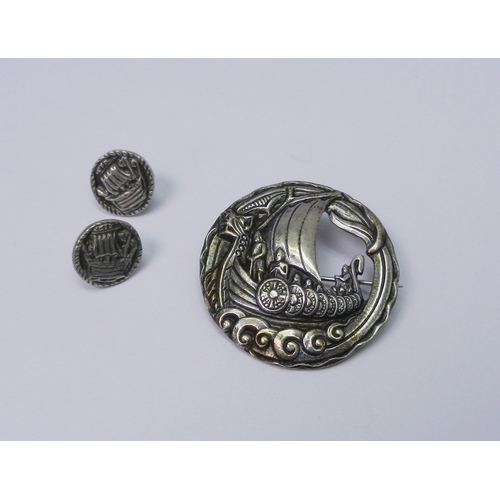 121 - A Robert Allison silver Viking Longship motif brooch, Glasgow 1952, 40mm diameter; a pair of stud ea... 