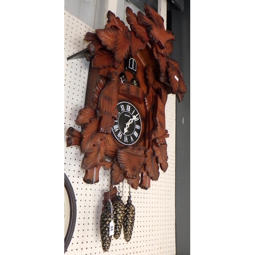 44 - A large modern Black Forest style wall clock