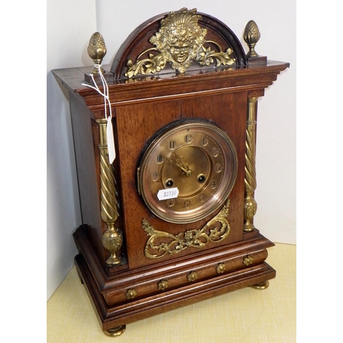 45 - A brass mounted walnut 8 day striking mantle clock