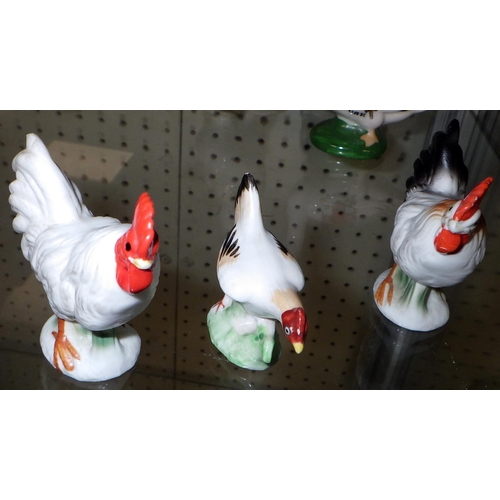 110 - A small group of various ceramic chickens & ducks