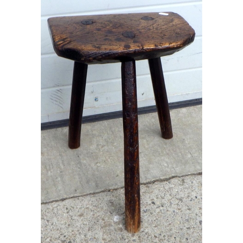 An 18th cen rustic oak milking stool, 48cm tall