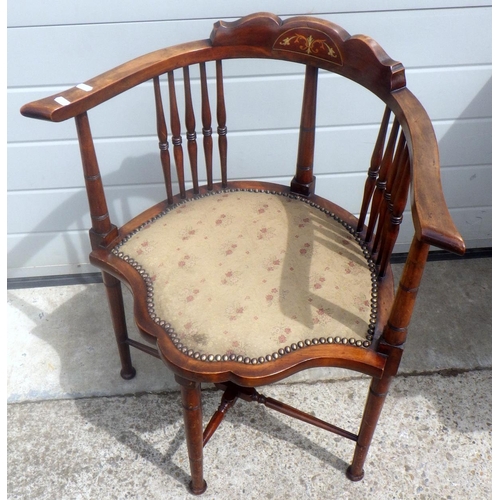 756 - An Edwardian corner chair with inlaid top rail and close nailed upholstered seat