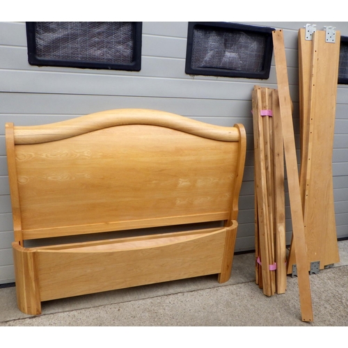816 - A modern light oak double bed frame