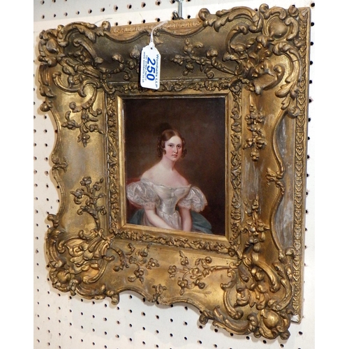 Portrait of a young lady, unsigned painting on plaque, 19th cent.  Presented in a gilt frame. 12 x 15cm within frame / frame 29 x 32cm.