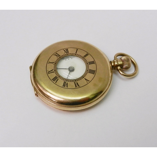90 - A Waltham pocket watch comprising a keyless wind lever movement in a 9ct gold half hunter case.  50m... 