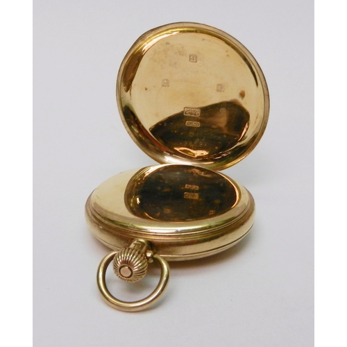 90 - A Waltham pocket watch comprising a keyless wind lever movement in a 9ct gold half hunter case.  50m... 