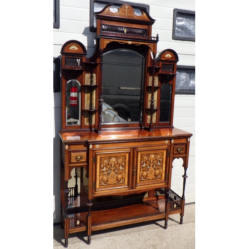 821 - A late Victorian inlaid mirrorback chiffonier, 130cm wide, 230cm tall, mirror foxed to edge.
Gov.Uk ...