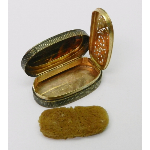 132 - A George III oval silver vinaigrette box, the sides and base engine turned, the top inlaid with an a... 