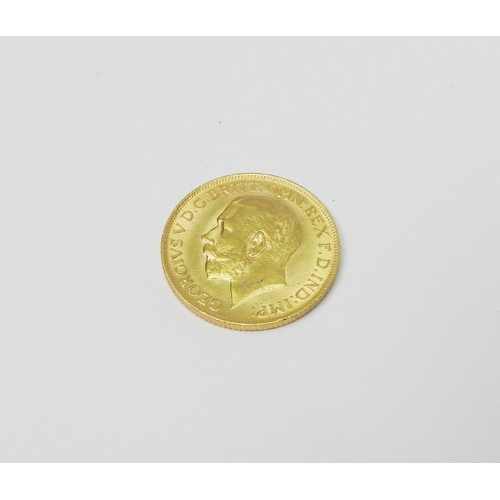 141 - A George V 1911 full sovereign.  GOLD BULLION COINS - VAT EXEMPT.