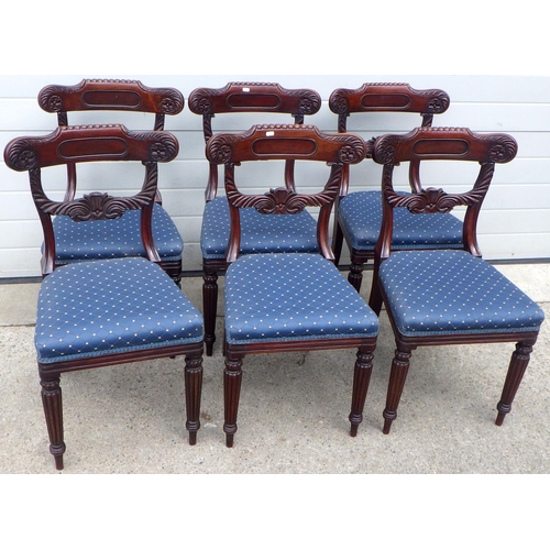 A set of six early 19th cen mahogany dining chairs on reeded legs, repairs