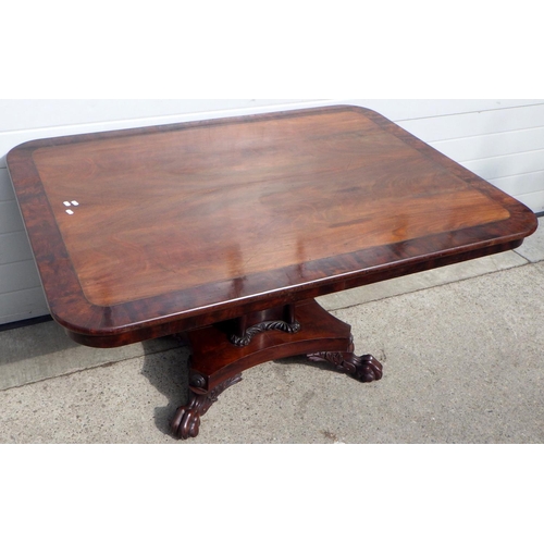 A mahogany breakfast table with crossbanded rectangular top 141cm long