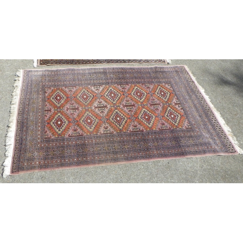 706 - A Pakistani style rug 100 x 160cm together with a further rug 125 x 200cm , moth damage (2)