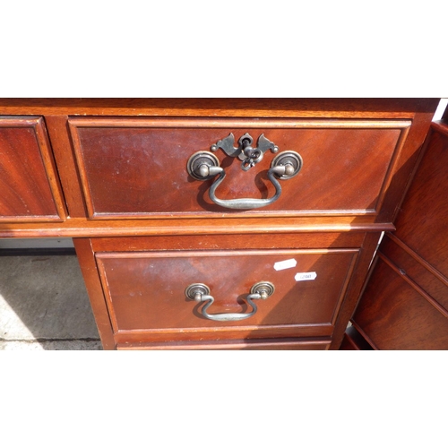 713 - A reproduction mahogany red leather topped pedestal desk and filing cabinet (2)