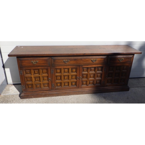 721 - A Toledo style oak sideboard, 207cm long