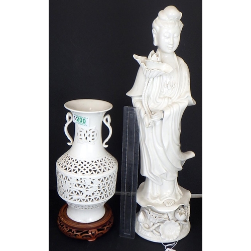 200 - A large Chinese Guanyin blanc de chine figure 52cm tall together with a similar lamp base on stand (... 