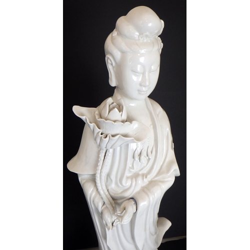 200 - A large Chinese Guanyin blanc de chine figure 52cm tall together with a similar lamp base on stand (... 