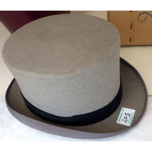 205 - A Royal Anglian officer's dress cap together with two top hats and a bowlers hat (4)