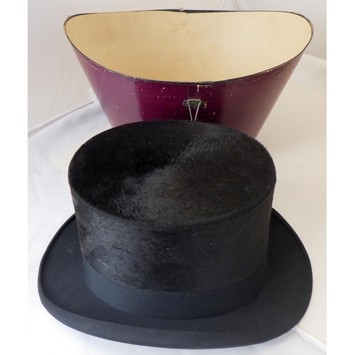 205 - A Royal Anglian officer's dress cap together with two top hats and a bowlers hat (4)