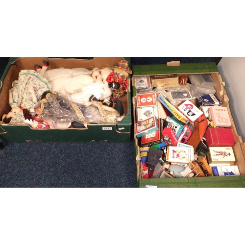 233 - Two boxes of misc dolls, playing cards etc (2)