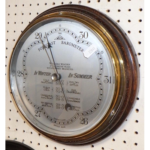 264 - A Wilson forecast barometer together with a clock and mirror (3)