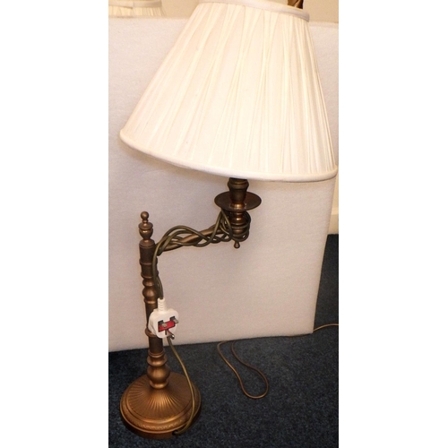 282 - A brass standard lamp together with a pair of brass table lamps and another (4)
All electricals sold... 