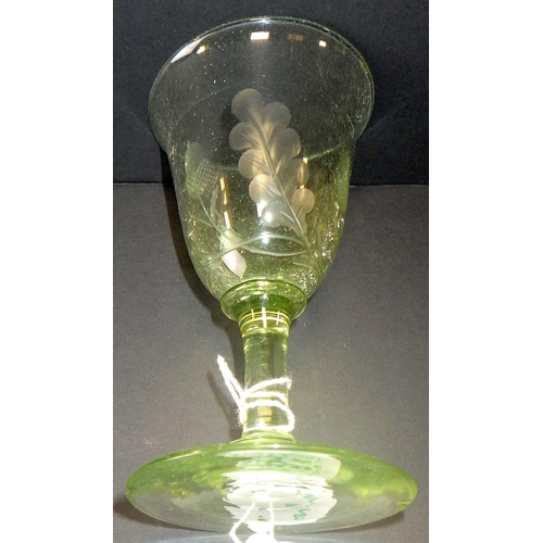 285 - Two 19th century green coloured etched wine glasses