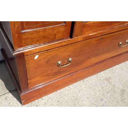 734 - An Edwardian mahogany & inlaid single door wardrobe 125cm wide