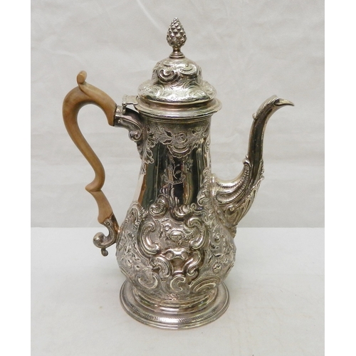 24 - A George II coffee pot of baluster form, chased and repousse decoration, John Langlands I, Newcastle... 