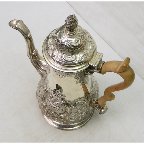 24 - A George II coffee pot of baluster form, chased and repousse decoration, John Langlands I, Newcastle... 