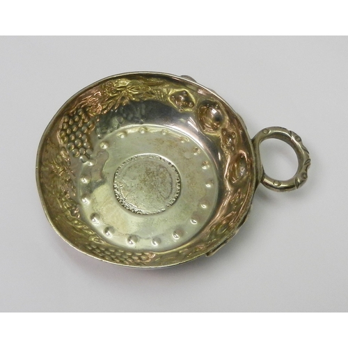 29 - A wine tasting cup silver inset with a James I shilling coin, London 1914, 102mm long; a Victorian s... 